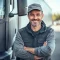 man-with-grey-hat-grey-shirt-is-smiling man-with-grey-hat-grey-shirt-is-smiling